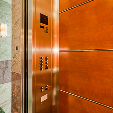 Thumbnail image of open elevator cab door at Plaza Tower  in Costa Mesa, California