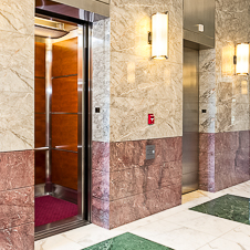 Thumbnail image of open elevator cab door at Plaza Tower  in Costa Mesa, California